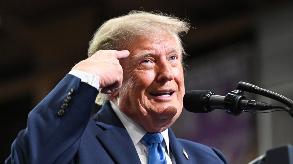 President Donald Trump speaks on stage at the Butler-Vandalia Student Activity Center during a campaign rally on Oct. 03, 2026 (Roberto Schmidt/Getty Images)
