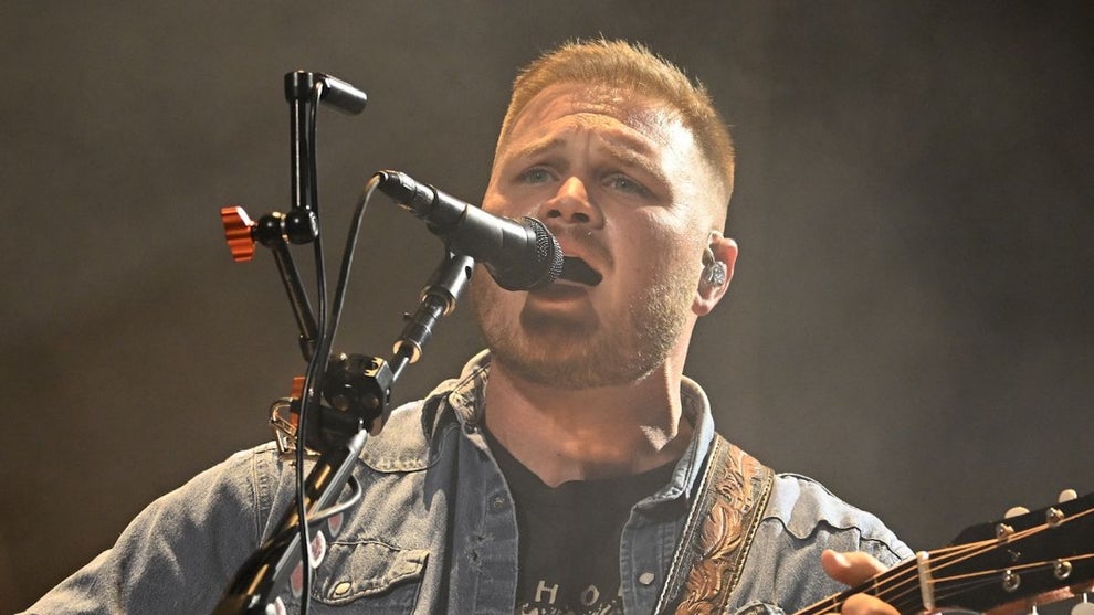 Zach Bryan performs during his With Heaven On Tour at L&N Federal Credit Union Stadium on April 11, 2026 in Louisville, Kentucky. (Photo by Stephen J. Cohen/Getty Images)