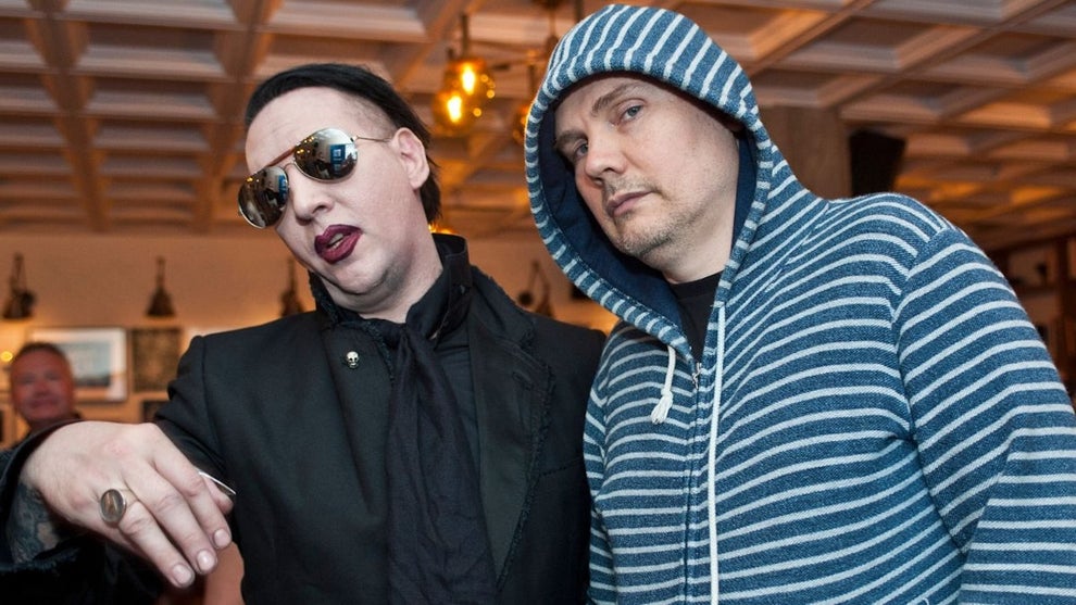 Marilyn Manson and Billy Corgan attend SiriusXM's Town Hall With Marilyn Manson And Billy Corgan on August 6, 2015 in Chicago, Illinois. (Photo by Timothy Hiatt/Getty Images for SiriusXM)