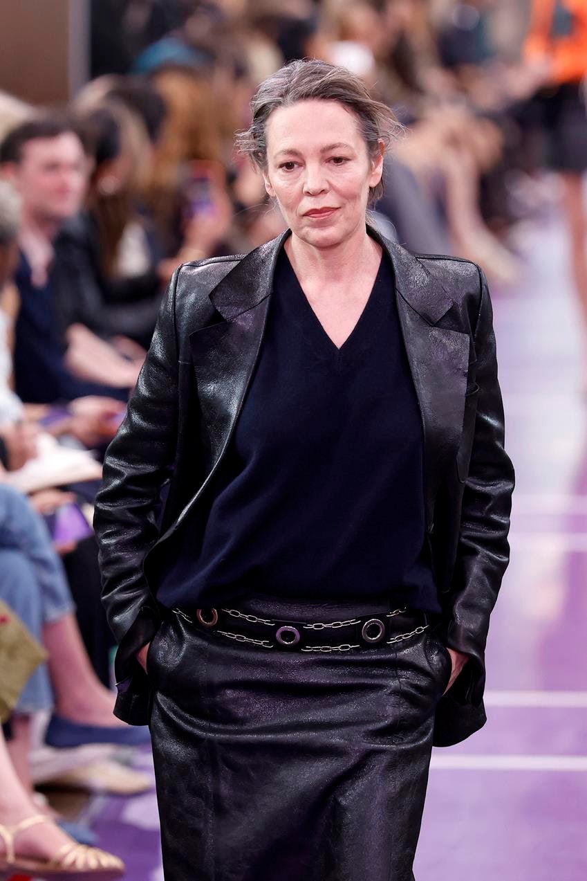 Olivia Colman walks the runway at the Miu Miu Spring 2027 show. Source: Getty