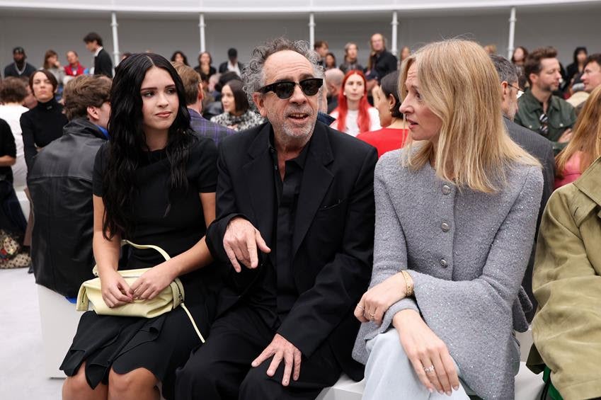 Nell Burton, Tim Burton and Delphine Arnault at the Loewe Spring 2027 show. Source: Getty
