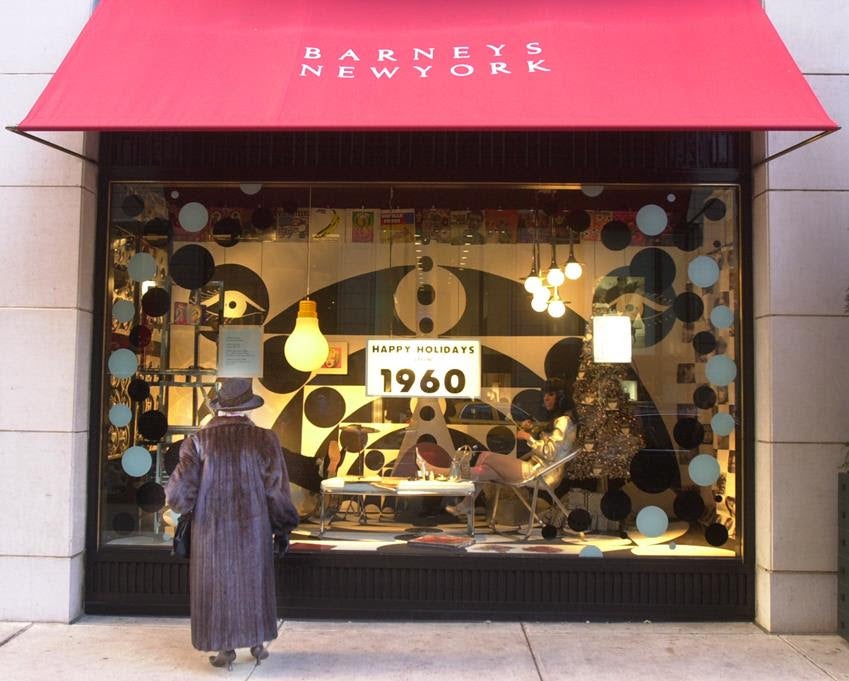 Barneys New York storefront in November, 2000. The store used live models in its holiday windows that year, with each window themed after a different decade. Source: Getty