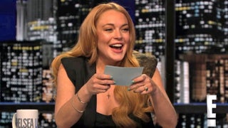 Lindsay Lohan Mocks Kristen Stewart, Harry Styles While Guest-Hosting ‘Chelsea Lately’ (Video)