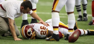 NFL, Ex-Players Agree to $765M Settlement in Concussion Suit