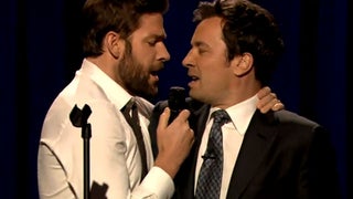 John Krasinki Battles Jimmy Fallon on ‘Late Night,’ Lip-Sync Style (Video)